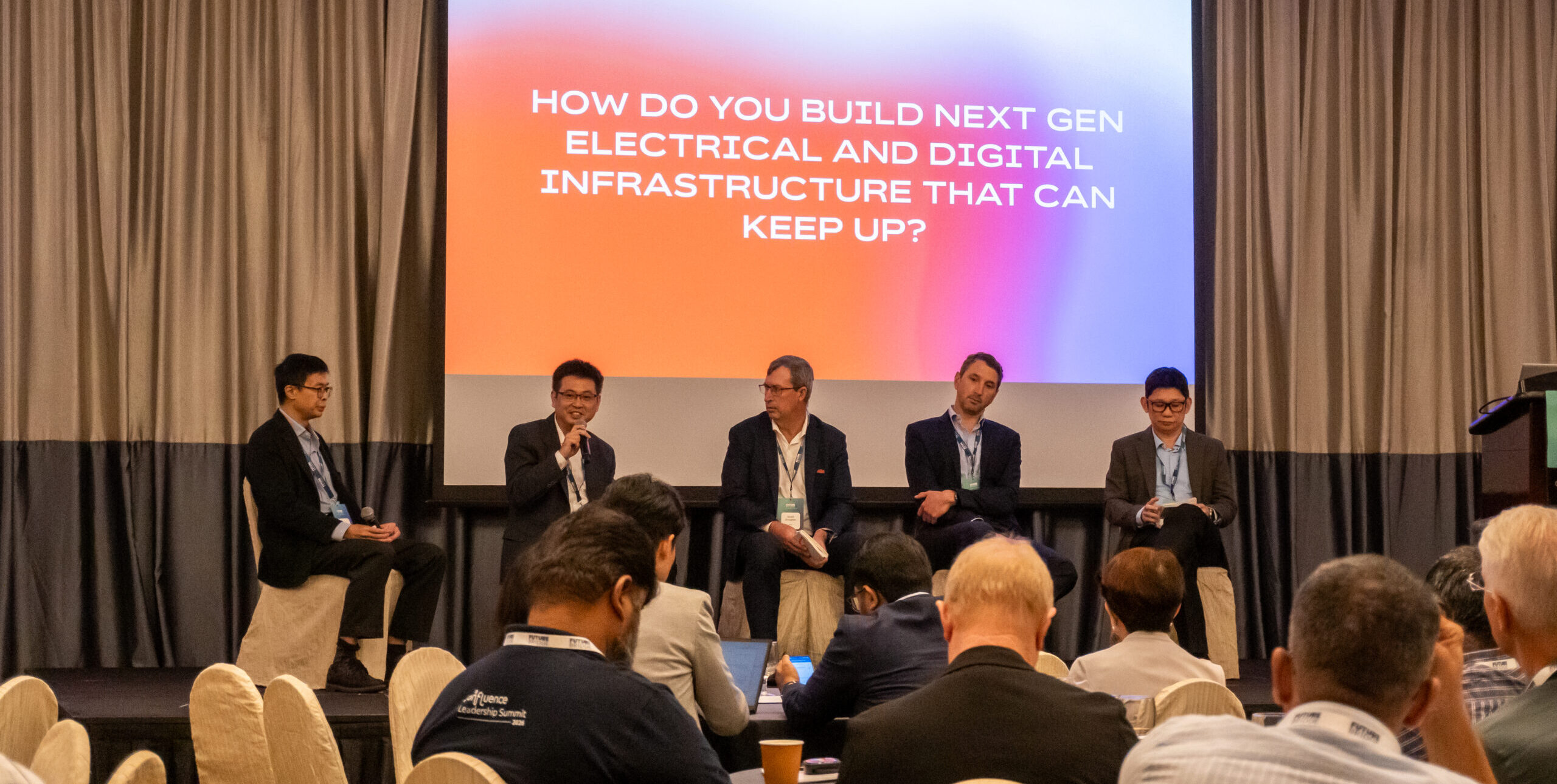 A conference session in progress at a Future Bridge summit